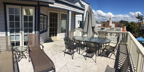 Private deck area with grill. Umbrella table seats 8.