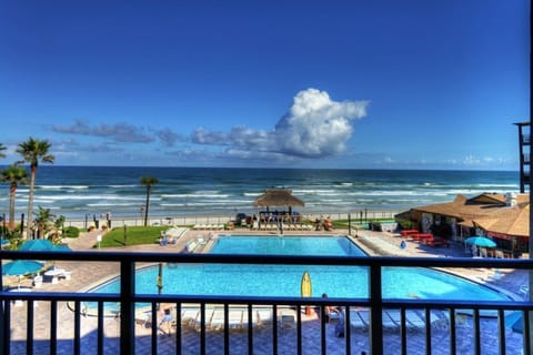 Relax high above the pool deck. Your private balcony overlooks the Atlantic Ocean.