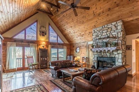 Living room with leather furniture and fireplace