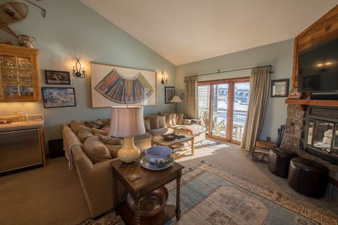 Living room and deck with views of Mt. Crested Butte