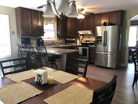 Table seats six and has a leaf to seat more