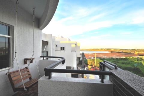 Signature Room, Multiple Beds, Non Smoking, Partial Ocean View | Balcony view