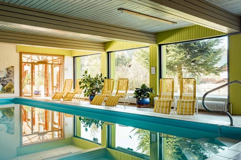 Indoor pool, open 7:00 AM to 8:30 PM, sun loungers