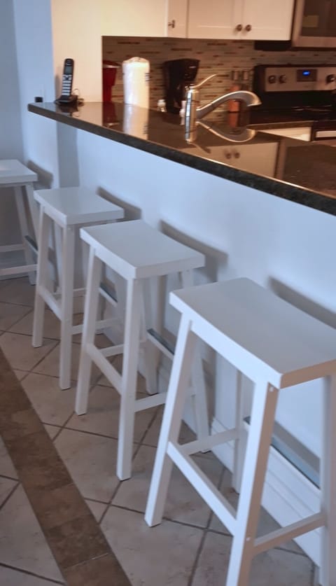 NEW BREAKFAST BAR with an extra comfy stools!