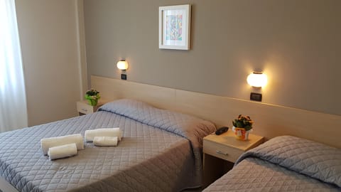 Triple Room, Sea View | In-room safe, desk, blackout drapes, soundproofing