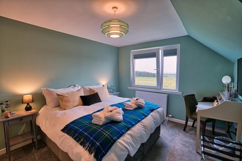 Desk, laptop workspace, blackout drapes, soundproofing