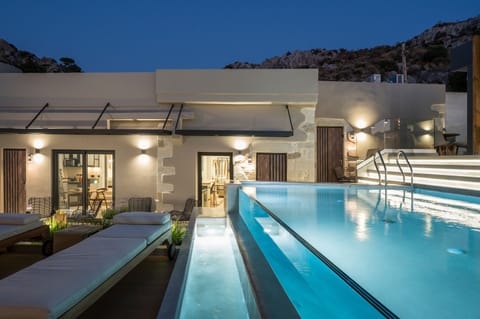 Outdoor pool, open 10:00 AM to 9:00 PM, pool umbrellas, sun loungers