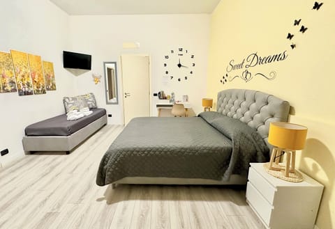 Family Quadruple Room | Desk, free WiFi, bed sheets