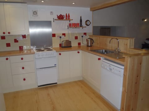 Fully fitted kitchen includes dishwasher. A Washing Machine is also available.