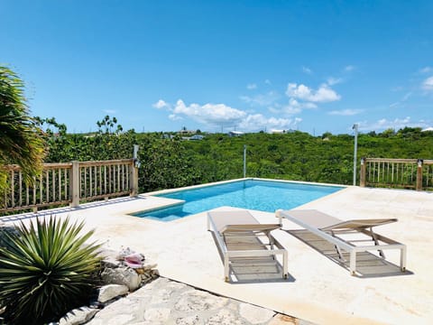 Private pool with 4 chaise lounges. Sunset view over the hills