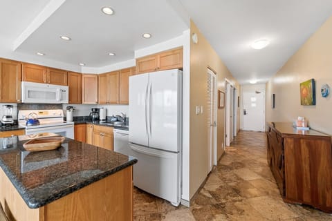 Looking down hall to entrance door.