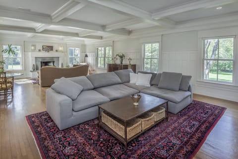 34x22 foot great rm off the kitchen with cloud sofa, large smart tv, fireplace
