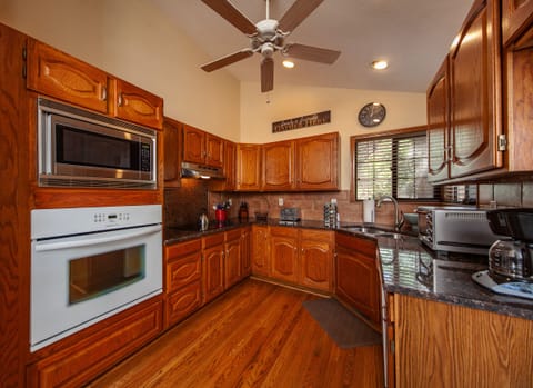 Beautiful oak kitchen with views out to beautiful scenery of Colorado!