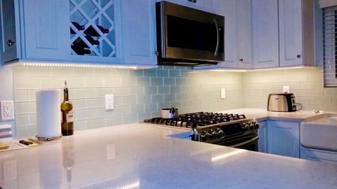 Under cabinet lighting gives subtle character in the evenings