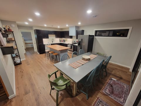 New Large kitchen with Lakeview, access to screen porch. Spring 2024.