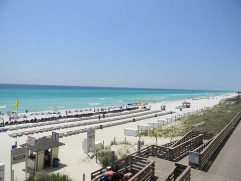 Only steps down to the beach from condo.This is the actual view from our Balcony