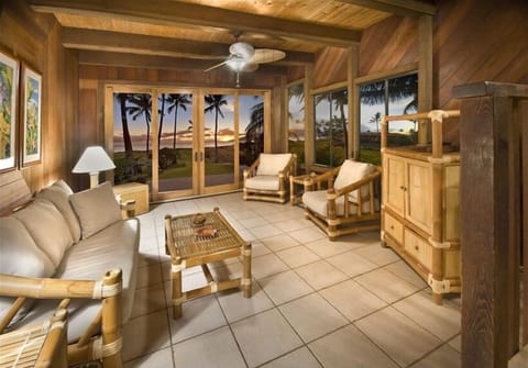 Living Room - Tile floors, bamboo furniture, and custom redwood throughout