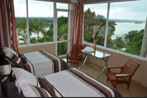 Design Quadruple Room, 2 Double Beds, Non Smoking, River View | In-room safe, individually decorated, individually furnished