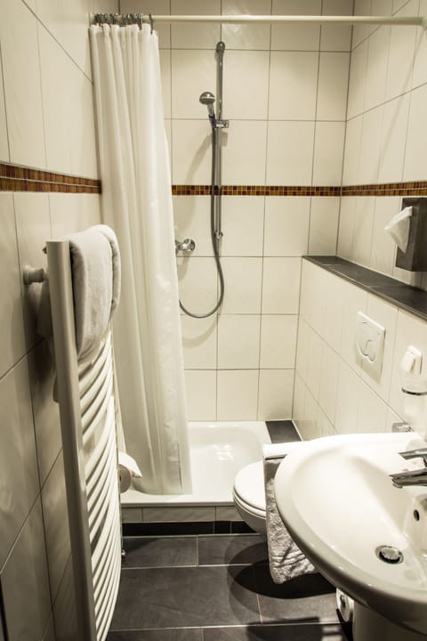 Shower, free toiletries, hair dryer, towels