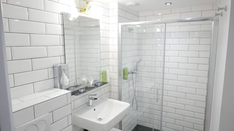 Shower, rainfall showerhead, hair dryer, towels