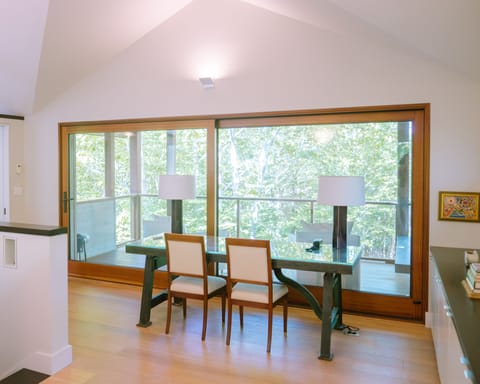 Large glass topped desk upstairs is perfect for remote work.