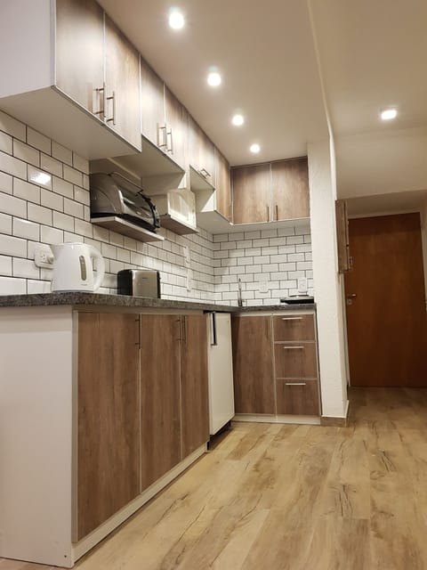 Apartment, 2 Bedrooms | Private kitchen | Fridge, oven, stovetop, coffee/tea maker