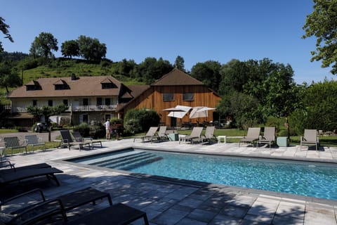 Seasonal outdoor pool, pool umbrellas, sun loungers