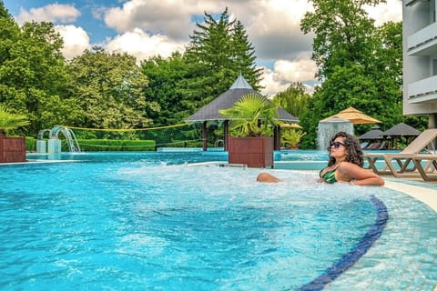 3 indoor pools, outdoor pool, open 8:00 AM to 8:00 PM, pool umbrellas