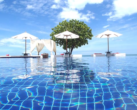 Outdoor pool, pool umbrellas, sun loungers