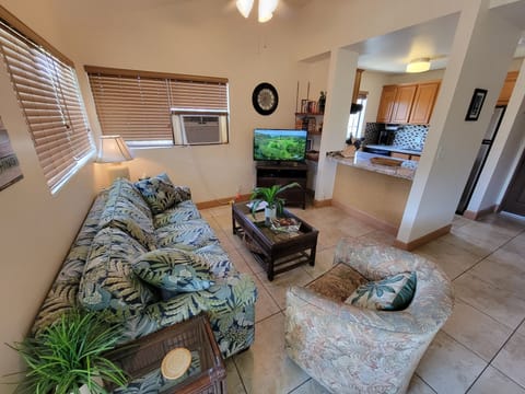 Living area to kitchen and entry