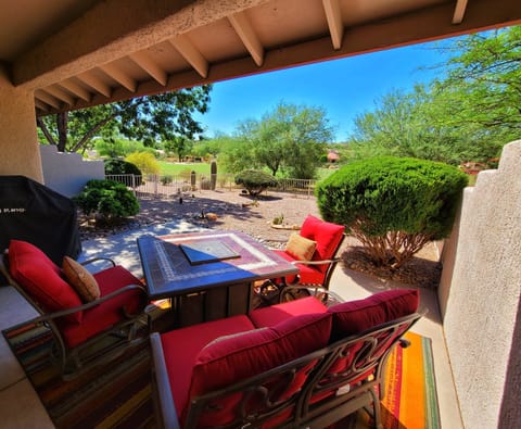 Covered Patio with a peaceful golf course view