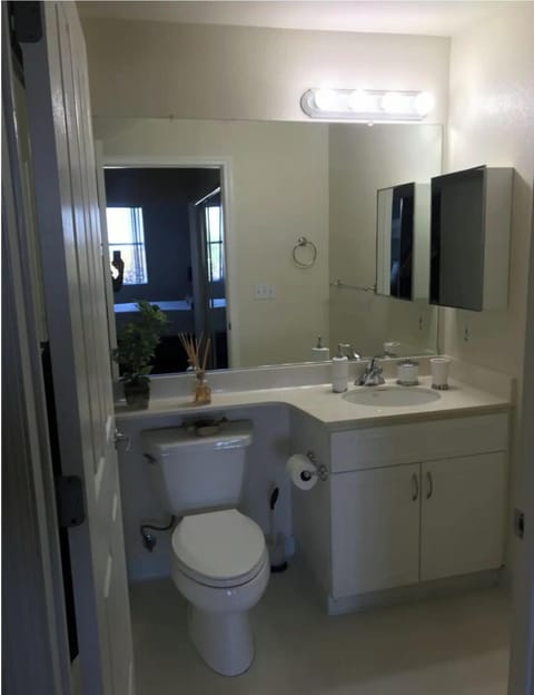 Full master bathroom with tub and shower (behind door)