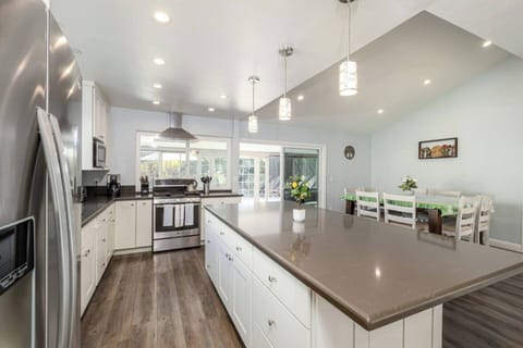 Gourmet Kitchen with top of the line appliances and cooking utensils