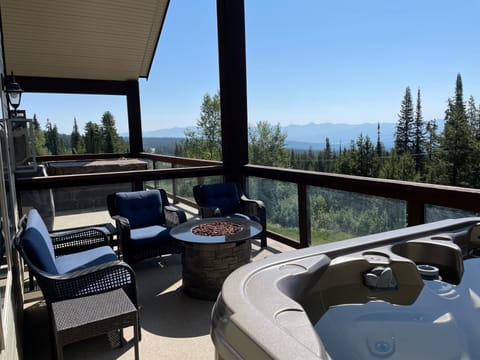Large deck with great vies, private hot tub, conversation set, fire pit and bbq