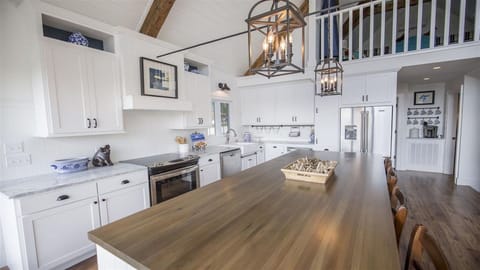 Large kitchen island seats nine. 