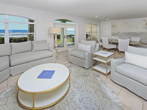 Relax in style as you view waves of the Gulf from your living, dining  & kitchen