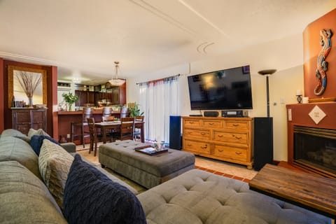 Living Space Equipped with a Huge TV & Surround Sound. 