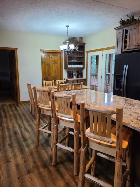 Open Floorplan includes a Kitchen Island  with Seating