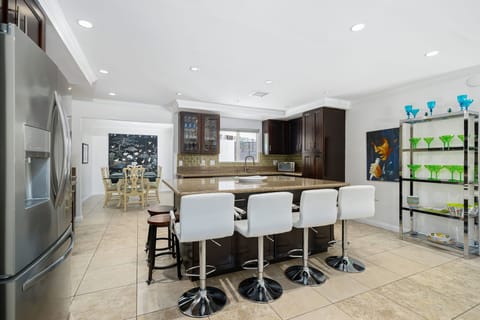 Kitchen, stainless steel, quartz countertops, wood cabinets