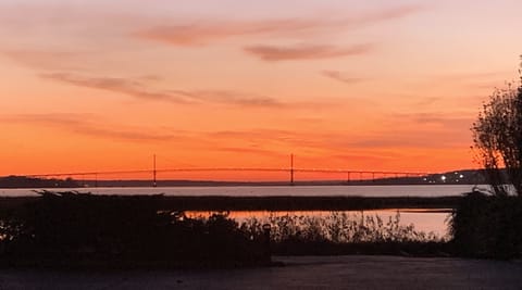 View of sunset and Mount Hope bridge, from the deck.