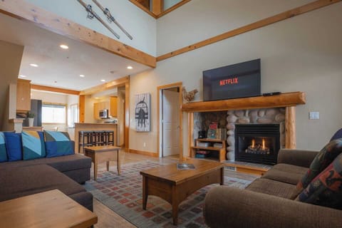 The hangout room, very cozy with games, gas fireplace and hot tub steps away! 