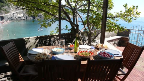 The terrace - covered lunch area with beautiful seaview