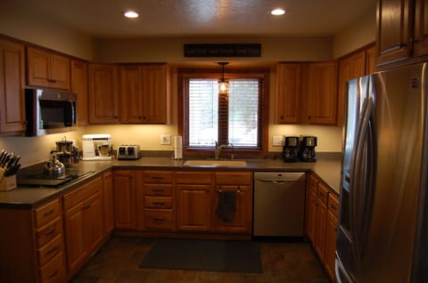 Kitchen with views of the back patio.