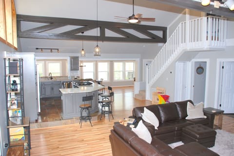 Living looking into kitchen and sunroom