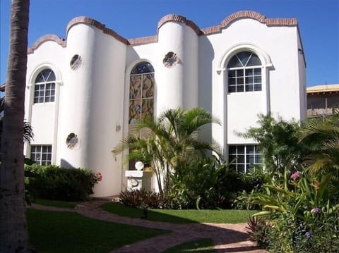 Front View Casa De Suenos -notice full length ocean scene stained glass windows