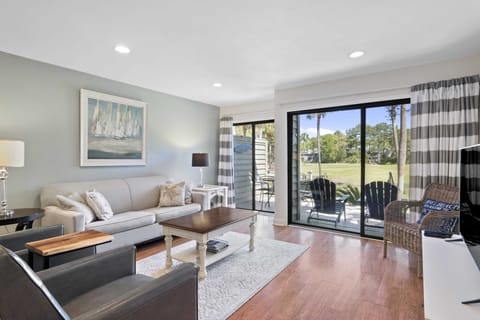 Spacious living room overlooking 6th Greeen Galleon golf course.