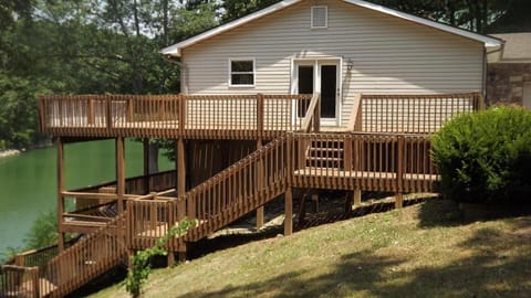 View of Home; decks overlooking the lake have plenty tables and chairs