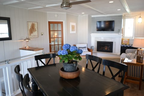 Great open dining and living room area with seats for every guest.