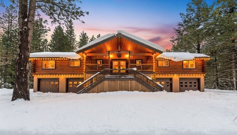 Grand front entrance with majestic mountain views.
