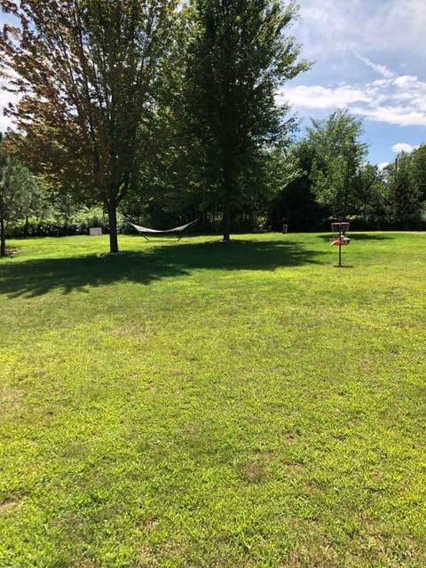 Over one acre to play on with disc golf and horseshoe pit and hammock!
